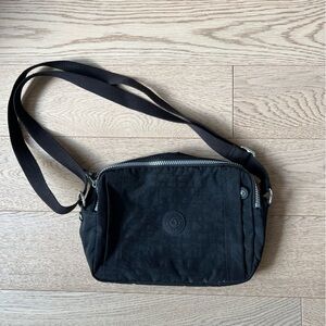 Kipling cross body bag, like lightweight canvas.